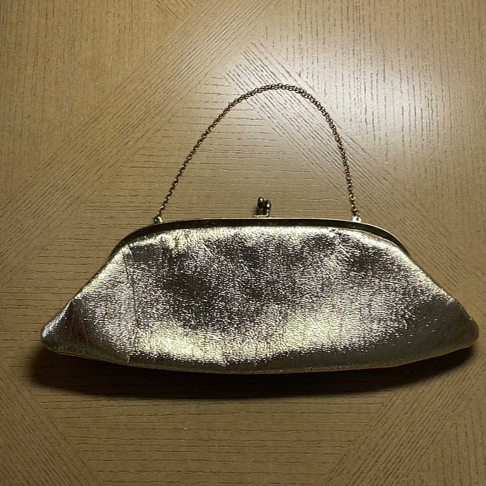 Shiny metallic gold bag of clutch